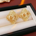 Macro view of vintage gold interlocking circle earrings with textured relief detail - Vintage Interlocking Rings Stud Earrings (25#)