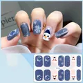 Detailed view of CS-435 gel nail stickers with blue glitter, snowmen and snowflake motifs - CS435