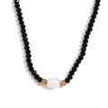 Collier de perles noires facettées avec une perle d'eau douce blanche centrale - Perles Noires