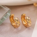 Orecchini a cerchio dorati minimalisti con motivi a stella incisi e zirconi cubici - Stella Incisa Oro (45168)