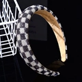 Detailed close-up of wide headband featuring black and white rhinestone geometric patterns - 3cm Checker Rhinestone Padded Headband [Black/White Checker]