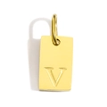 Detailed macro view of an 18k gold plated rectangular pendant with letter V engraving - Pendant V (Without Chain)