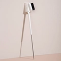 Double-ended eyebrow and eyelash grooming tool with white handle and black brush fibers - White