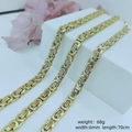 Three 6mm wide golden stainless steel chains in 70cm length displayed on white block - 6mm*70cm / Gold