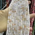 Détail macro de perles carrées en pierre naturelle blanche et orange pour bijoux DIY - 4x4mm (Environ 38cm Fil) / Aventurine Rose