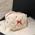 Beige cotton quilted makeup bag with cherry pattern and red ribbon bow accent - Beige Cherry Pattern