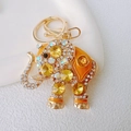 Cute cartoon elephant keychain with orange rhinestones and gold alloy metal finish - Orange
