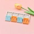 Silicone baby letter cake mold set for fondant and chocolate on pink background - BABY Letter Blocks Style
