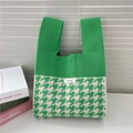 Detail of green and white houndstooth knit tote bag with brand label and soft texture - 21*34cm / Green