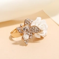 Golden butterfly and rose ring with white rhinestones and a central rectangular stone - White
