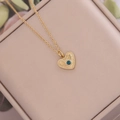 Collar de corazón dorado con colgante de gema azul sobre estuche para joyería fina - Corazón De Estallido Estelar Radiante (1#)