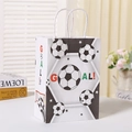 Soccer themed white gift bag with GOAL text and football prints for sports party favors - GOAL With Stars Print
