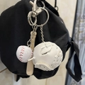 Mini baseball keychain with bat and glove charms hanging on a black bag strap - 2CM White Ball Long Bat White