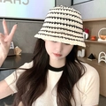 Beige knitted straw bucket hat with black stripe pattern shown on a female model - L (54cm-58cm) / Off-white Frayed Hollow