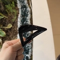 Close-up of a black triangular hair claw clip with a glossy finish and strong spring - 8cm / Glossy Black