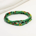 Detailed close-up of double-layer colorful seed beads on a white fabric background - 80cm / Green Red Yellow Black Mix