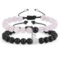 Braccialetti di coppia in quarzo rosa e pietra nera opaca con cuore magnetico su sfondo bianco - Bracciale Quarzo Rosa + Pietra Smerigliata