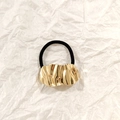 Minimalist gold wavy hollow metal hair tie with black elastic band on white paper - Gold Irregular Pleated 5cm