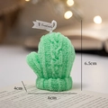 Mint green glove-shaped scented candle with realistic knit texture and small flag label - Light Green Gloves - Grapefruit Sea