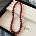 Elegant deep red glass bead necklace with gold clasp and heart pendant on beige tray - 6# Necklace - Red 9mm with Heart Pendant