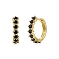 Detail shot of golden hoop earrings featuring micro-paved black round cubic zirconia stones - Gold with Black Pave Huggie