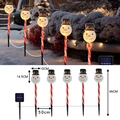 Solar powered Christmas snowman garden stakes with 5 heads and red white striped poles - Snowman with Black Hat (Red Tube)