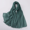 Detail shot of deep green pearl chiffon shawl with sparkling rhinestones texture - Bean Green
