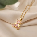 18K gold plated necklace with pink zircon bear pendant on soft beige silk background - Pink Bear