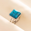 Macro detail of bohemian adjustable stainless steel ring with turquoise stone inlay - Silver/Dark Blue Turquoise