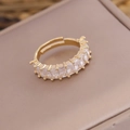 Macro detail of 18K gold plated open ring featuring square-cut clear zircon stones - Adjustable Open / White