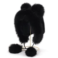 Detalle de gorro con orejeras de piel sintética negra con pompones sobre soporte dorado - Talla única / Negro