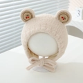 Detailed close-up of beige knitted baby hat with cherry embroidery and cute bear ears - 6 Months - 2 Years / Beige