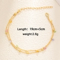 Close-up of gold double-layer chain bracelet with multi-colored heart zircon stones - Colored Zirconia Style (A0184)