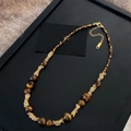Macro detail of tiger eye beaded necklace with spiral gold spacers and 39cm length info - Gold Brown Beaded Necklace / Chain 39cm + Extender 7cm