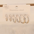 Macro shot of three pairs of silver stainless steel hoop earrings with sparkling rhinestones - 2# Round (Silver)
