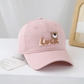 Detailed view of pink cotton kids baseball cap with Luck bear silicone applique - 54cm (3-8 Years) / Pink