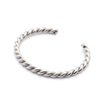 Minimalistische gedraaide open manchetarmband in een glanzende gepolijste zilveren finish - Gedraaid Patroon 1 / 1# Zilver