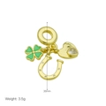 Detail of 30mm gold charm with green clover, horseshoe, and crystal heart pendant - Clover Heart Horseshoe Set
