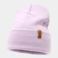 Detail showing light purple ribbed knit beanie with a brown leather logo patch - Light Purple