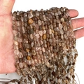 Irregular natural rutilated quartz stone beads with brown needle inclusions - Copper Rutilated Quartz