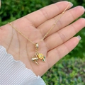 Gouden ketting met gieter en zonnebloem hanger met micro-ingelegde zirkoon - Zonnebloem