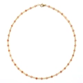 Detail of beaded sweater necklace with orange faceted stones and gold metal tubes - SL1361-Orange
