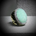 Macro shot of green drusy crystal ring with gold hammered band and halo rhinestones - Adjustable Open / Green