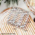 Set of six silver spiral Christmas candy cane ornaments in festive winter packaging - Silver