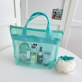 Turquoise mesh organizer bag with double handles and cartoon eye patch for travel - Handbag Style / Green