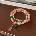 Close-up of double-layer beaded bracelet with colorful fluorite and golden charms - 15# Clear Pearl
