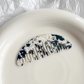 Mini acetate hair comb with black and white marble pattern in a crescent moon shape - Black