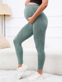 Dettaglio dei leggings premaman senza cuciture con supporto addominale e trama a rete - S / Verde