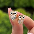 Charming golden owl stud earrings featuring large clear round zircons and enamel details - A Pair Of Gold Led-161