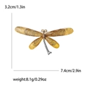 Dragonfly brooch with amber translucent wings and champagne rhinestones in silver finish - Brown